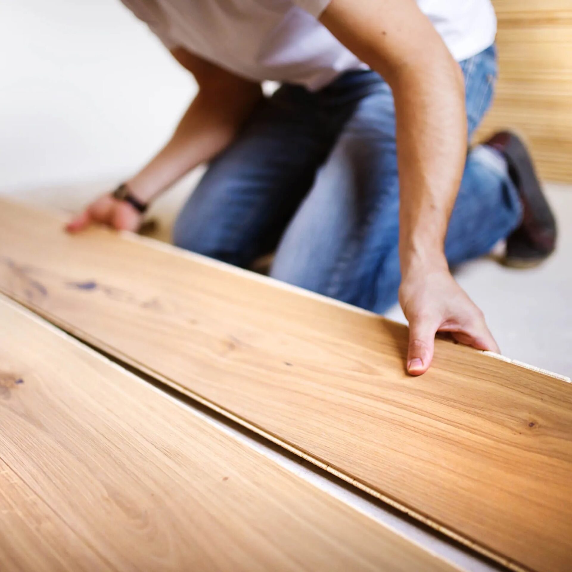 Flooring professional installing laminate floors